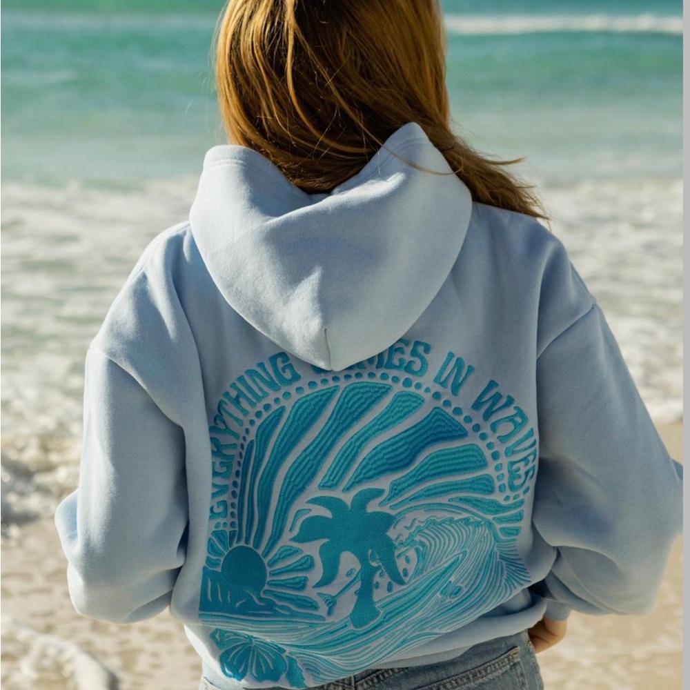 pink palm puff everything comes in waves blue hoodie